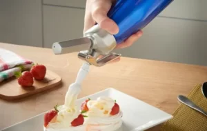 Whipping cream with a cream dispenser 